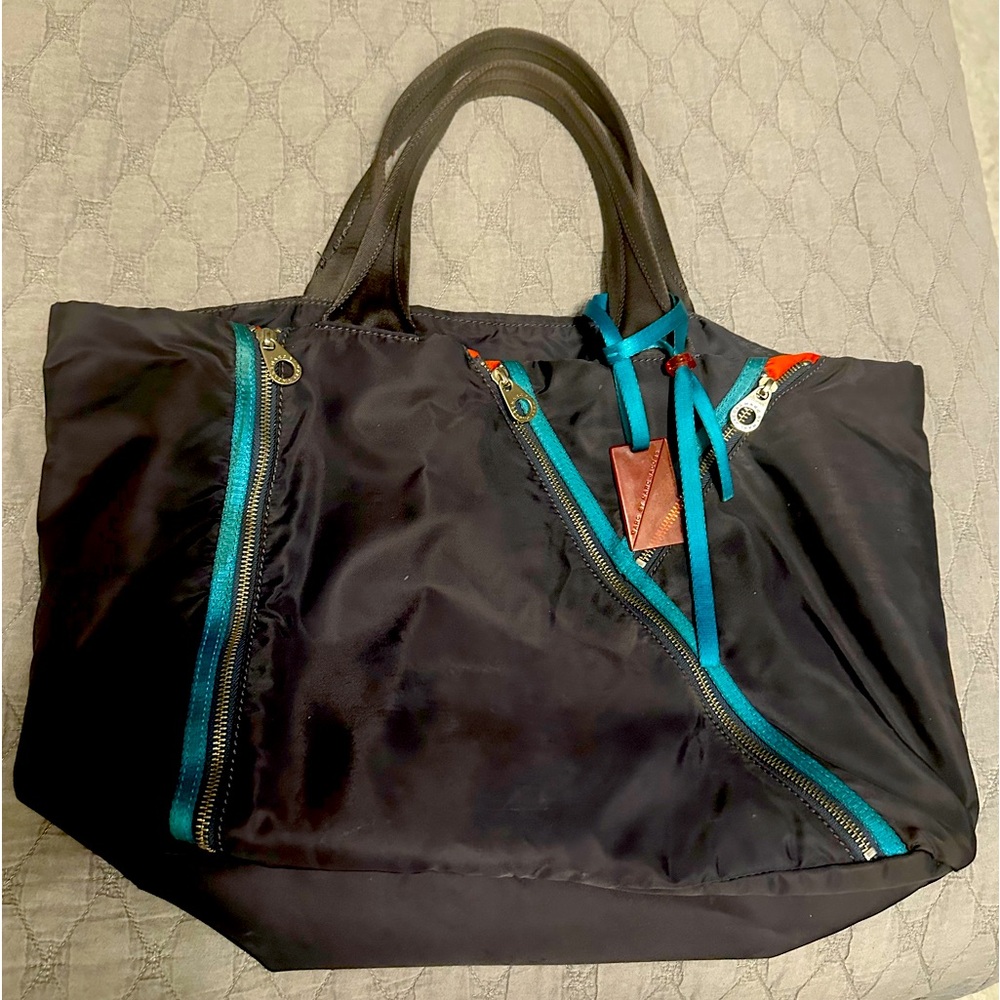 Marc by Marc Jacobs designer bag that effortlessly combines functionality!